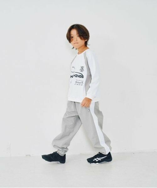 and D.petitmain / アンドディー. プティマイン その他パンツ | 【セットアップ対応可】ライン入りナイロントラックパンツ | 詳細1