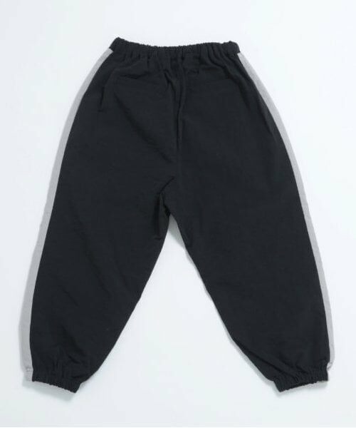 and D.petitmain / アンドディー. プティマイン その他パンツ | 【セットアップ対応可】ライン入りナイロントラックパンツ | 詳細10