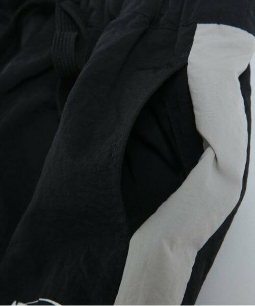 and D.petitmain / アンドディー. プティマイン その他パンツ | 【セットアップ対応可】ライン入りナイロントラックパンツ | 詳細14