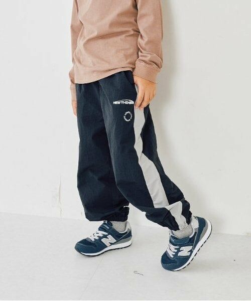 and D.petitmain / アンドディー. プティマイン その他パンツ | 【セットアップ対応可】ライン入りナイロントラックパンツ | 詳細4