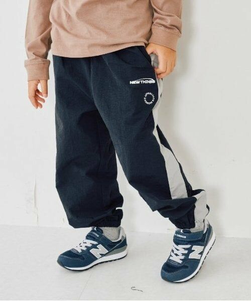 and D.petitmain / アンドディー. プティマイン その他パンツ | 【セットアップ対応可】ライン入りナイロントラックパンツ（黒）