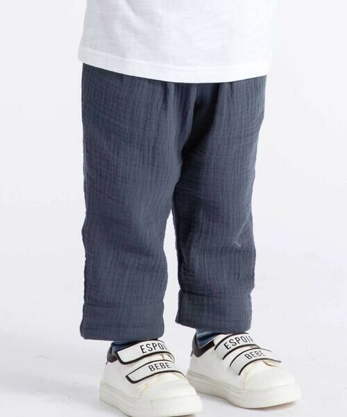 BeBe / べべ チノ・ワークパンツ | コットンガーゼ裾ボーダーロングパンツ(80~100cm)（ネイビー）