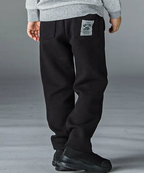 BeBe Petits Pois Vert/ベベ プチ ポワ ヴェール 斜めボンディングロングパンツ(95~150cm) ブラック 100cm BeBe Petits Pois Vert/ベベ プチ ポワ ヴェール 斜めボンディングロングパンツ(95~150cm) ブラック 100cm