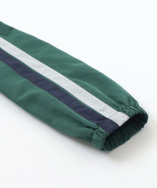 BeBe Petits Pois Vert / ベベ プチ ポワ ヴェール ナイロンジャケット | ドローコード付き配色タフタジャケット(95~150cm) | 詳細17
