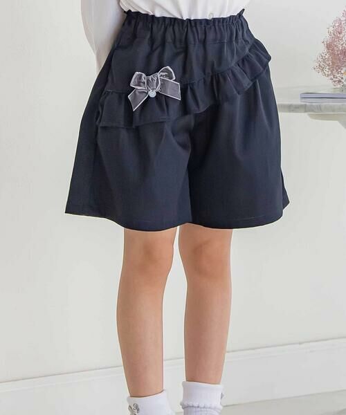 BeBe Petits Pois Vert / ベベ プチ ポワ ヴェール ショート・ハーフ・半端丈パンツ | 【店舗限定】フリルリボンキュロットパンツ(95~150cm)(ネイビー)