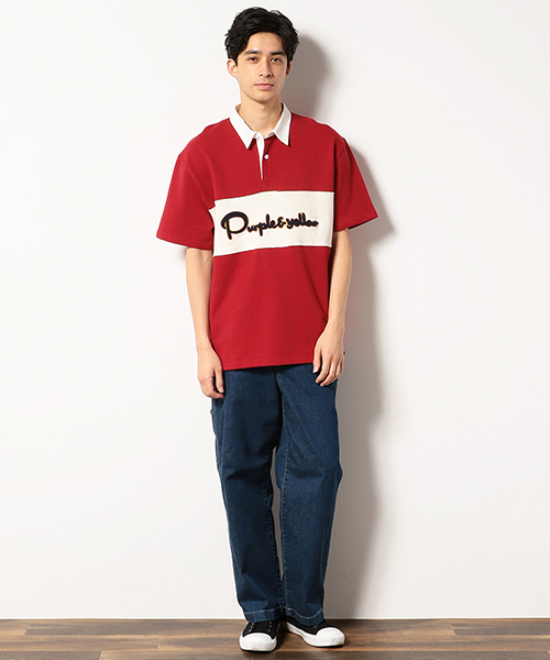 【パープル＆イエロー】 フロントのサガラワッペン、バイカラーのバランス、 程よい厚みの素材感が、 この春夏にぴったりのラガーシャツ。 太めのデニムと合わせてぬけ感を出して。