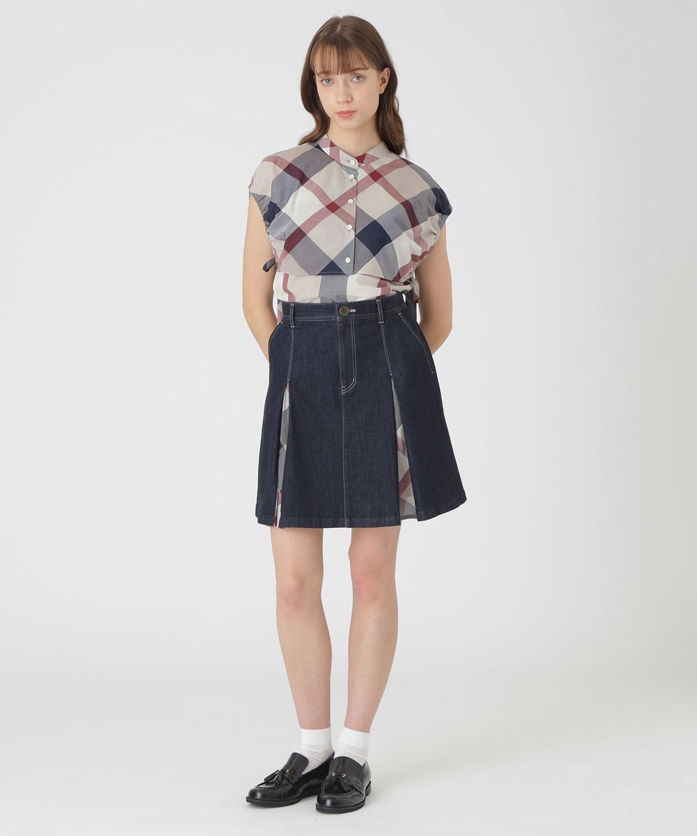 【トップス】身頃部分が取り外し可能なチェックブラウスです。アウト側は、袖のキャザーとリボンががアクセントになっています。インナー側は、シンプルなノースリーブです。【スカート】タック部分から覗くクレストブリッジチェックがポイントです。プレッピースタイルが完成するアイテムです。