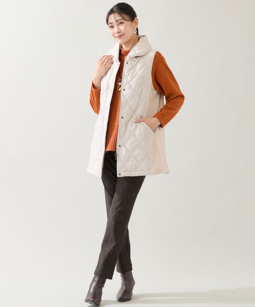 【大きいサイズ】軽く羽織れて暖かいキルティングベストにオレンジのインナーを効かせたお出かけスタイル