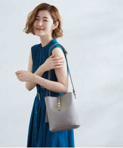 grove / グローブ ショルダーバッグ | 人間工学ベルトタッセル縦型ショルダー