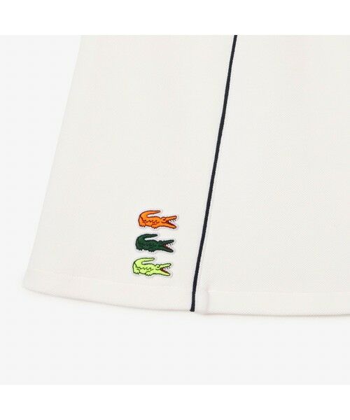【オフホワイト】マルチカラーワニロゴパッチパイピングテニススカート