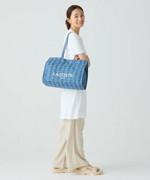 【新品】LACOSTE×SWAROVSKI ニットワンピース ワニロゴ 38 美品】LACOSTE ワニロゴ 38 M ロングワンピース ネイビー - メルカリ