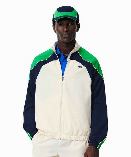 美品LACOSTE アイボリー ナイロンセットアップ セール】 配色切り替えセットアップトラックスーツ セットアップ
