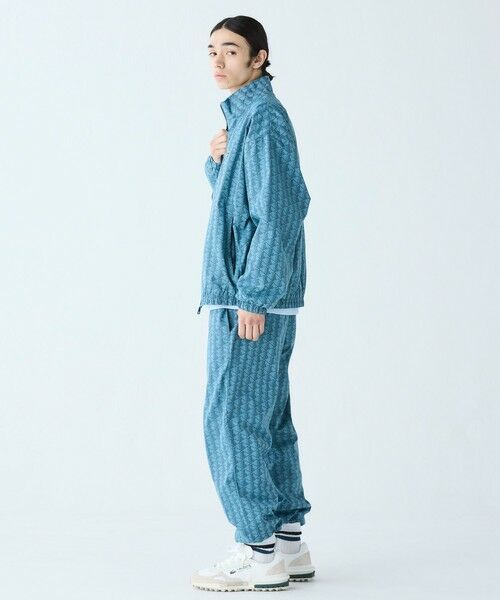 美品 S LACOSTE ジャガード トラックパンツ モノグラム ブルー モノグラムジャカードトラックパンツ ／ サイドラインパンツ