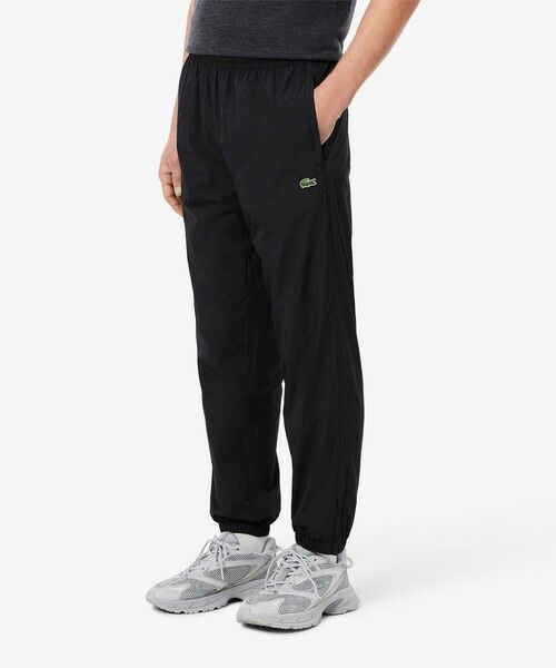 LACOSTE/ラコステ ワッシャー加工 ナイロン 軽量撥水トラックパンツ ブラック 5(日本サイズXL) LACOSTE/ラコステ ワッシャー加工 ナイロン 軽量撥水トラックパンツ ブラック 5(日本サイズXL)