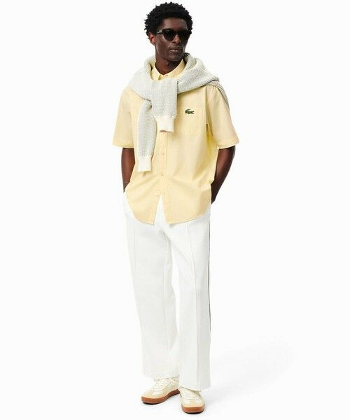 【人気✨】LACOSTE ホワイト ダウンベスト USＬおおきめ ゆったり ユニクロ公式 | ウルトラライトダウンベスト