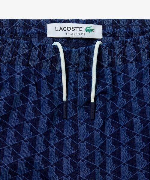 LACOSTE / ラコステ チノ・ワークパンツ | インディゴスウェットモノグラムトラックパンツ | 詳細19
