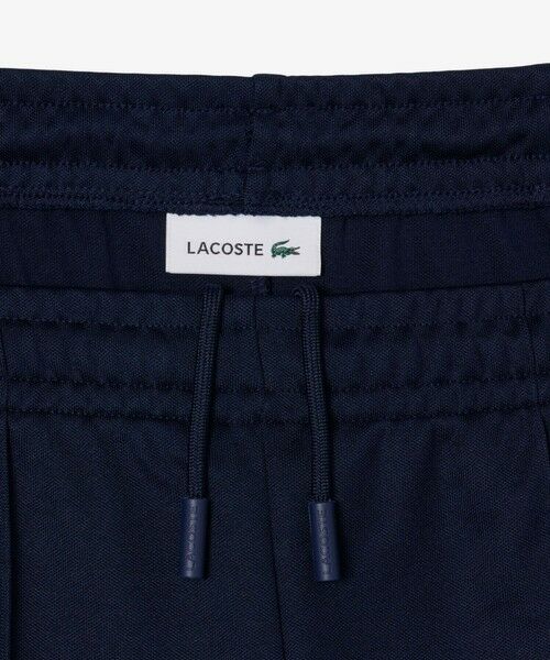 LACOSTE / ラコステ チノ・ワークパンツ | 鹿の子ジャージフレアトラックパンツ | 詳細5