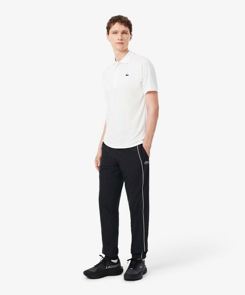 LACOSTE / ラコステ チノ・ワークパンツ | 配色パイピング撥水トラックパンツ | 詳細3