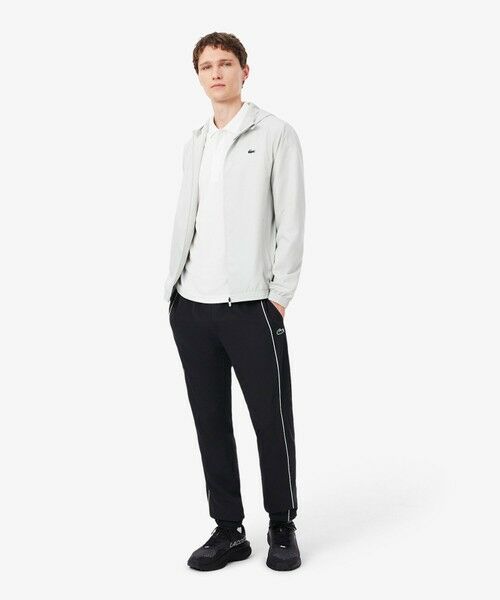 LACOSTE / ラコステ チノ・ワークパンツ | 配色パイピング撥水トラックパンツ | 詳細2