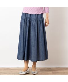 ■商品紹介■<br><font color='#0063B1'>◆大人カジュアルに甘さを添えてくれるデニムスカート◆</font><br><br>薄手で軽やかなデニムを使用したスカートです。<br>ゴワつき感の少ない柔らかい風合いで、歩く度にひらひらと揺れる裾がフェミニンです。<br><br>ウエストはオールゴムでゆったり快適。<br>ウエスト下の切り替えや千鳥柄のステッチがさり気ないポイントになっています。<br><br>裏地のない軽快な穿き心地で春夏のお洒落にピッタリのカジュアルスカートです。<br><br>・手洗い可<br><br>【モデル身長166cm】<br><br><br>■コーディネート■<br>Tシャツやカットソーとの甘カジュアルなコーディネートをお楽しみいただけます。<br>フラットシューズやスニーカーと合わせて軽快にコーディネートしてくださいね。<br><br>■商品特性■<br>素材の厚さ：やや薄い<br>素材の透け感：やや透ける<br>素材の光沢：光沢がない<br>素材の伸縮性：なし<br>裏地仕様：裏なし<br>ウエスト仕様：総ゴム仕様（開きなし）<br>脇ポケットあり<br><br><br>■コンセプト■<br>旬なデザイン、素材を使ったトレンドアイテムから上質で高級感溢れるエレガンスアイテムまでを揃えたタウンコーディネートブランド。<br><br>＊撮影環境により光の当たり具合で色味が違って見える場合があります。<br>＊商品画像はサンプルのため、色味やサイズ、プリント位置、仕様などに変更がある場合があります。<br>＊取扱い表示をご確認の上、着用をお願いします。<BR>