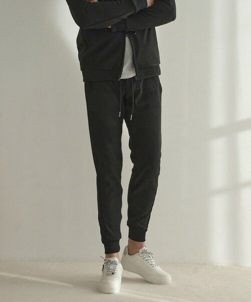 MEN'S BIGI / メンズビギ その他パンツ | 【1PIU1UGUALE3 RELAX/ウノピゥウノウグァーレトレ リラックス/別注/セットアップ対応/ストレッチ素材】カモ柄ニットジャガード スリムイージーパンツ（ブラック）