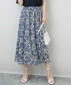 セットアップでワンピース見えの着こなしも<br><br> ■デザイン<br> 涼しげな印象の更紗模様のプリントシフォンスカート。落ち感がある素材は広がりすぎないので甘くなりすぎず大人っぽく着こなせます。ウエストゴムでストレスフリーな着心地も嬉しい。<br><br> ■素材<br> 透け感のあるシフォン素材は軽やかな印象。伸縮性のあるサテンスムースの裏地付きで透け感も気にせず、着心地アップのケアをしています。<br><br> ■コーディネート<br> 軽やかで広がりすぎないシルエットが大人な印象で着こなせます。総柄ですが落ち着いたカラー展開は大人のコーデにもマッチ。同素材のブラウスとセットアップでワンピース見えの着こなしも楽しめるので、セットで持っておくと何かと便利な一枚です。<br><br> --------------------<br> 着用シーズン<br> 春：◎　夏：◎　秋：◎　冬：○<br> --------------------<br> 洗濯表示：洗濯機洗い可<br> 透け感：あり<br> 裏地：あり<br> 伸縮性：なし<br> ウエスト：ゴム仕様<br> 生地の厚さ：薄手<br> --------------------<br><br>  ■スタッフ着用コメント <br><br>＜スタッフ身長：157cm/着用サイズM(38)/普段の着用サイズS(36)〜M(38)＞<br> 広がりすぎないシルエットがうれしい、さらりと履けるシフォンスカート。さらさらと揺れる軽やかな素材感で、季節を選ばずロングシーズンで着回せる一枚です。プリントの更紗柄は甘すぎず、ベースカラー配色の柔らかな見え感が素敵でした。ウエストは総ゴム仕様で一日中履いていてもストレスフリー。しわになりにくく洗濯機洗いも可能なので、ご旅行などの持ち運びにも便利なアイテムです。 <br><br>＜スタッフ身長：160cm/着用サイズM(38)/普段の着用サイズS(36)〜M(38)＞<br> 更紗模様が大人な印象のシフォンスカートです。シフォンの柔らかさと透け感で軽やかに着こなせます。ウエストゴムかつ、シワになりにくい生地で、ストレスフリーで履いていただけます。 同素材のブラウスとセットアップで、ワンピース見えの着こなしも楽しめます。 <br><br>＜スタッフ身長：157cm/着用サイズM(38)/普段の着用サイズM(38)＞<br> ブラウスと同素材のスカート。ウエストゴムではきやすさ抜群。シーズンレスで使えますが風が通ると涼しく感じられるので暑い季節にたくさん活躍させたい！単品でシンプルなTシャツと合わせるだけでも様になるので忙しい朝に時短コーデも叶います。<br><br>--------------------<br><br> ※自然光・照明の関係、パソコン・スマートフォンなどの環境により、実際と色味が違って見える場合がございます。予めご了承ください。商品の色味は、詳細画像をご参照ください。<br> ※サンプルでの撮影となるため、実際にお届けする商品と仕様やサイズが異なる場合がございます。