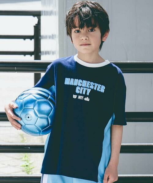 nexchic / ネクシック Tシャツ | 【Manchester City(マンチェスターシティ)コレクション】天竺バックロゴ半袖Tシャツ(110~150cm)(ネイビー)