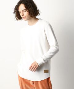 【素材】<br>21/-T/Cワッフル裏起毛<br>程よく肉厚に仕上げたT/Cワッフルの裏面に起毛を施して保温性を高めた素材になります。<br><br>【デザイン】<br>裾ラウンドの長袖クルーネックTシャツです。　　　　　　　　　　　　　　　　　　　　　　　　　　　　　　　　　　　　　　　1枚で着て頂ける肉感ですが、長めの着丈でレイヤードアイテムとしても着回すことが出来ます。<br>ミリタリーのインナー素材として広く使われているワッフル素材と相性の良いミリタリーテイストのピスネームが程よいアクセントになっています。<br>程よく細身のシルエットなので、スキニーパンツと合わせたIラインシルエットやワイドパンツと合わせたAラインシルエットの着こなしがオススメです。<br><br>レディースにもおすすめです。<br>レディースモデル（H164 B83 W60 H87 /着用サイズ：M)<br><br>裏地：無し<br>光沢感：無し<br>伸縮性：有り<br>生地の厚み：普通