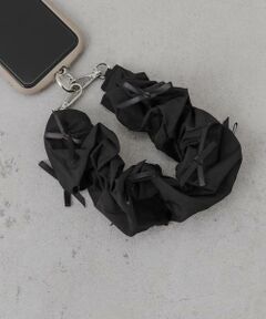 SMELLY / スメリー モバイルケース | リボンシュシュハンドルストラップ