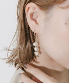 SMELLY / スメリー ピアス・イヤリング | イビツパールスウィングフープピアス