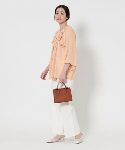 UNITED ARROWS フリル付きポロシャツ 五分袖 ベージュ UNITED ARROWS（ユナイテッドアローズ）の「ミニマル フリル